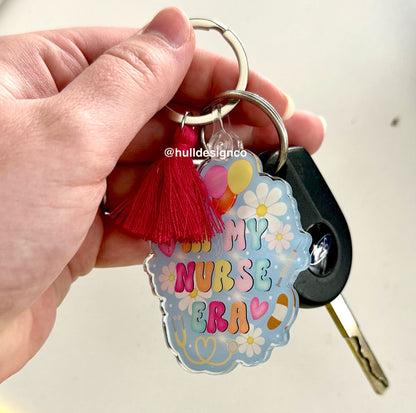 2.25 x 2.2 in. Nurse Era Keychain (Tassel Color Varies)